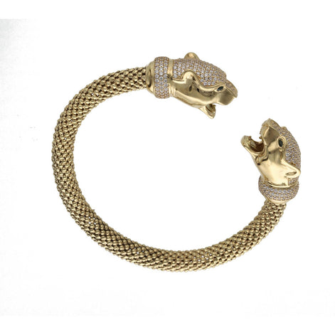 14K yellow gold popcorn chain panther bangle with CZ eyes on white background showing luxury animal bracelet design