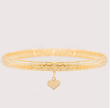 14 Karat Gold Heart Bangle