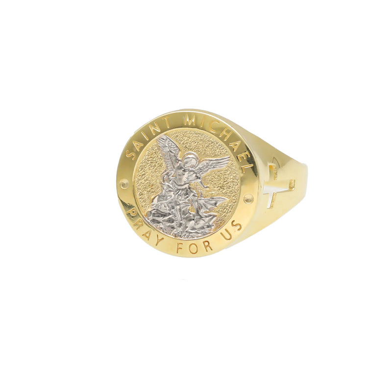 A top-down, slightly elevated studio product photograph of the 10K Two-Tone Gold Saint Michael Signet Ring, showing the complete central face and the upper part of the band