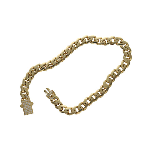 A 10 karat gold cuban link monaco style anklet with a zirconia stone push to open clasp open on a white background.