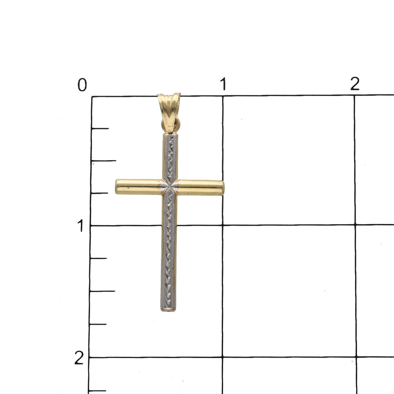 10K gold cross pendant two tones in ruled background as a size reference.