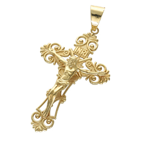 Gold cross pendant with intricate designs with the INRI word on a white background