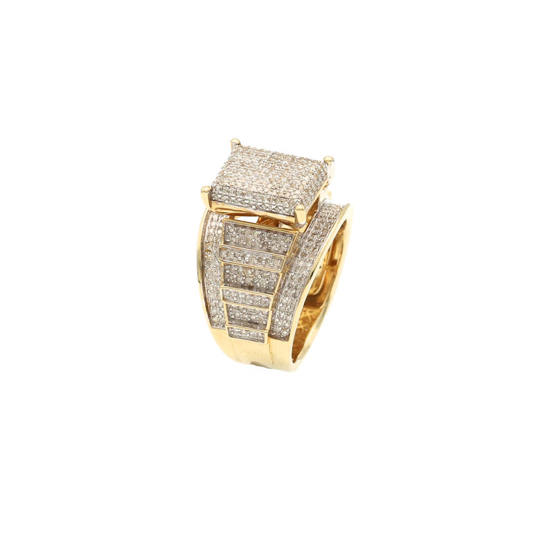 Side profile of a 10K yellow gold diamond ring showing the thick, decorative band and the elevated square-shaped diamond pave cluster.