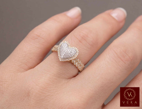 10K yellow gold heart promise ring with 0.35 CTW natural diamonds on a woman's ring finger, Veka Jewelry fine collection