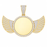 A 10K gold angel wings photo medal with a round blank center, accented by clear pavé stones along the border and wings, shown on a light gray background.