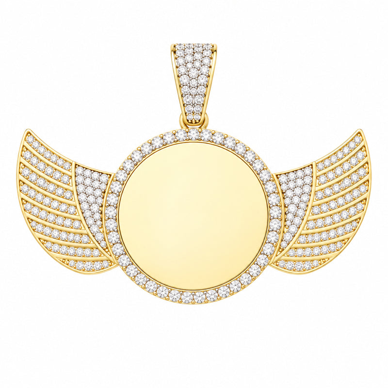 A 10K gold angel wings photo medal with a round blank center, accented by clear pavé stones along the border and wings, shown on a light gray background.