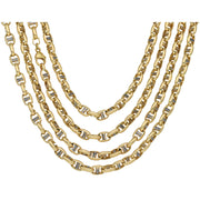 Layered 10K yellow and white two-tone gold mariner link chains showing 22 24 and 26 inch lengths