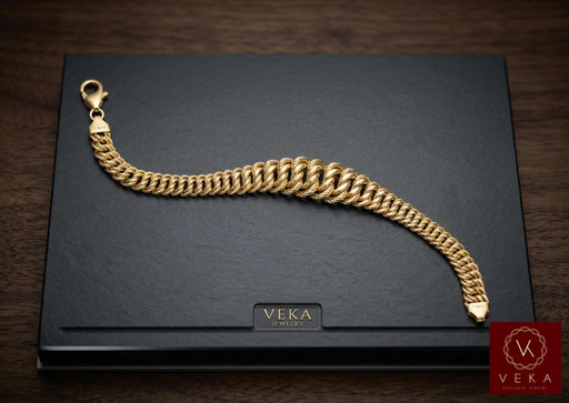 10K yellow gold Princess link bracelet with a tapered semi-solid design displayed on a black Veka Jewelry presentation box.