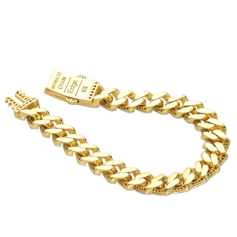 A plain, high-polish underneath of a 10K gold Miami Cuban link bracelet with an open box clasp, showing the base gold detail for the Monaco style