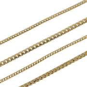Close-up detail showing the diamond-cut finish and woven chevron links of solid 10K Franco gold chains