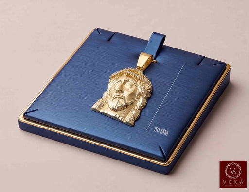 10K solid yellow gold Jesus face pendant with cubic zirconia crown displayed on a navy luxury box showing 50 mm height by Veka Jewelry