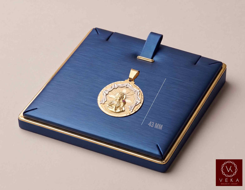 10K two-tone yellow and white gold Santa Barbara diamond-cut medal pendant 43mm presented on a navy blue jewelry display tray by Veka Jewelry