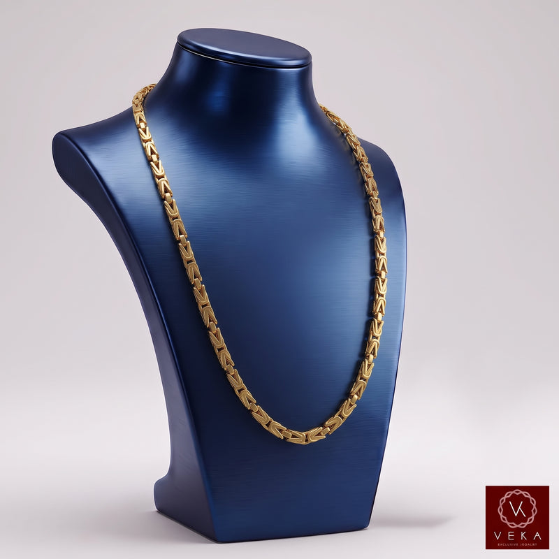 10K yellow gold 3mm byzantine chain necklace displayed on a metallic blue jewelry bust by Veka Jewelry.