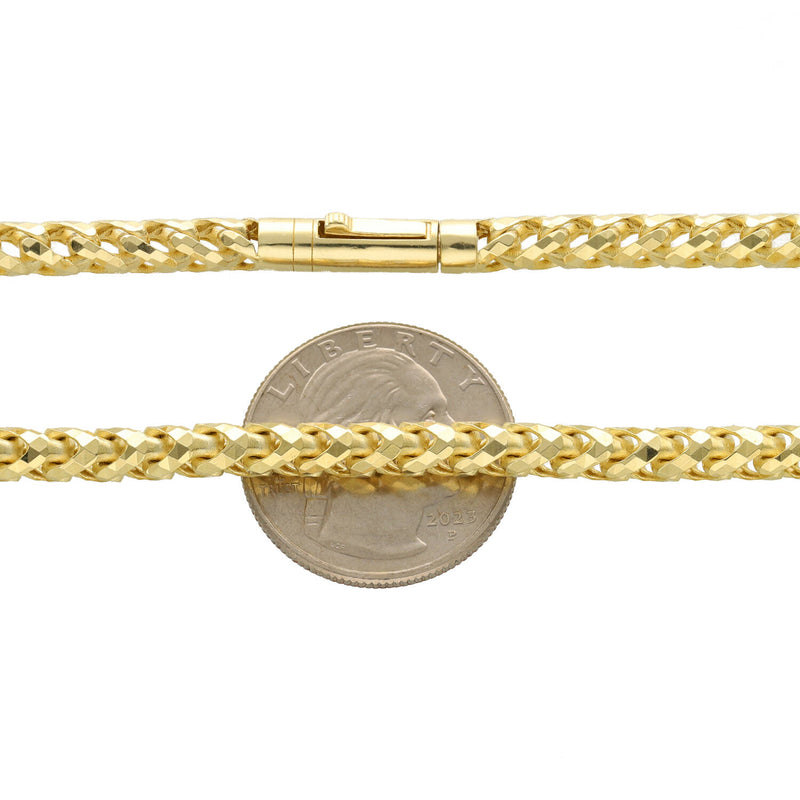 A close-up comparison of the 10K yellow gold diamond-cut Franco chain and its clasp next to a US Quarter coin to demonstrate its 4.5mm width.
