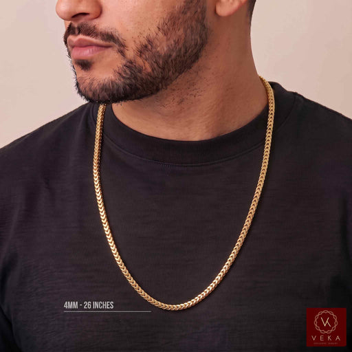 Man wearing 10K yellow gold hollow Franco chain necklace in 4mm width and 26 inch length
