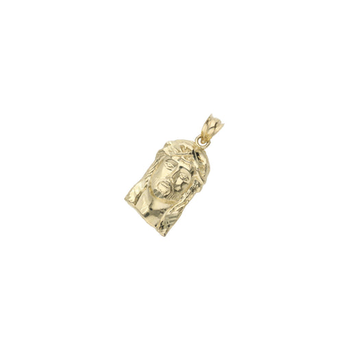 Angled detail shot of authentic 10K yellow gold Jesus face medal pendant showing diamond-cut finish and bail