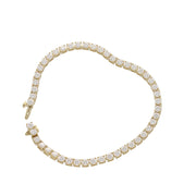 Close-up of a 10k yellow gold tennis bracelet with 48 round brilliant VVS moissanite stones, 3mm width, on a white background.