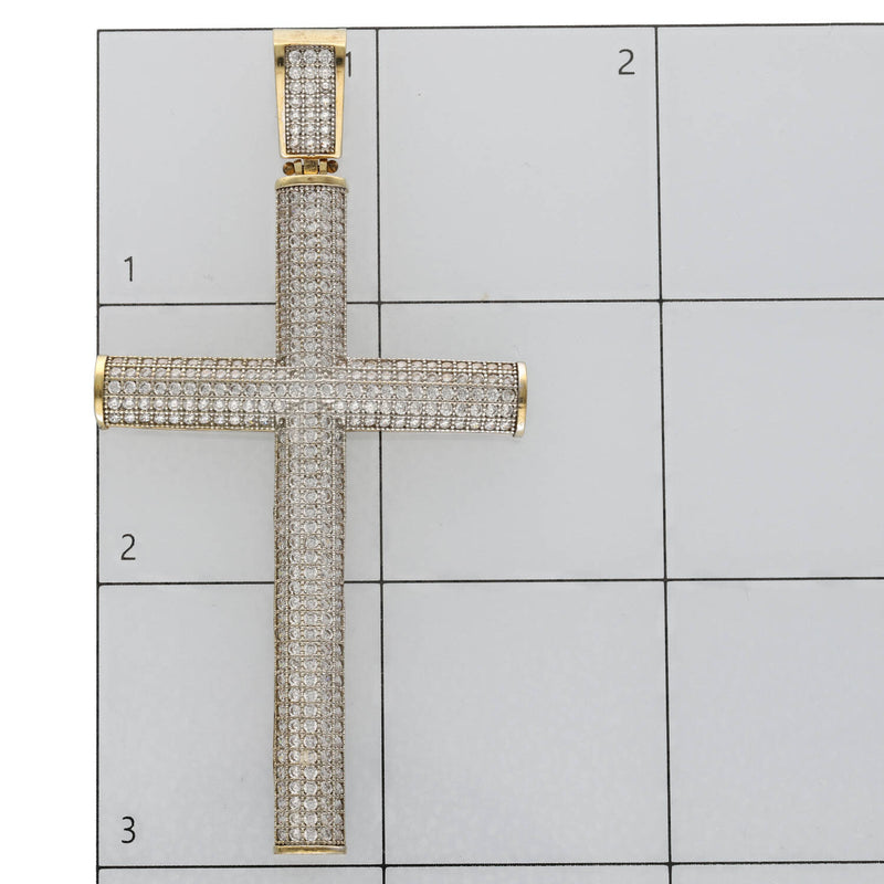 10k Real Gold cross pendant with Stones in a ruled background as a size reference