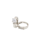 White Gold Wedding Duo with a Big Center Stone on the engagement ring and regular size stones on the ceremony band,