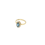14K yellow gold blue zircon ring with clear accent stones in halo setting - sapphire blue birthstone ring by VEKA JEWELRY