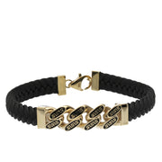 A black leather bracelet with gold-colored accents and textured Cuban links, featuring a lobster lock clasp.