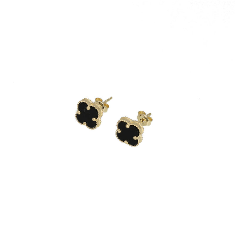 A pair of 14K gold onyx flower stud earrings with black floral design on white background