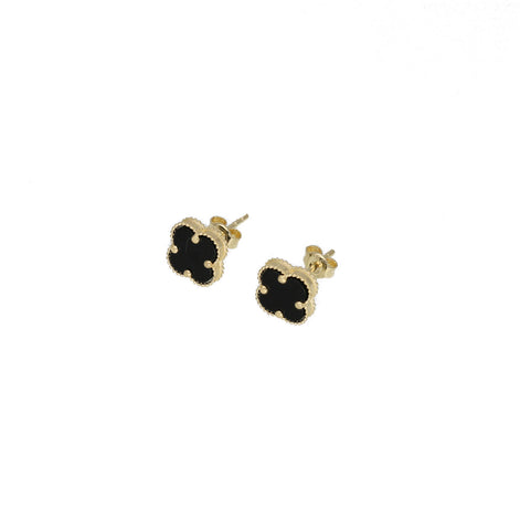 A pair of 14K gold onyx flower stud earrings with black floral design on white background