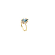 14K yellow gold blue zircon ring with clear accent stones in halo setting - sapphire blue birthstone ring by VEKA JEWELRY