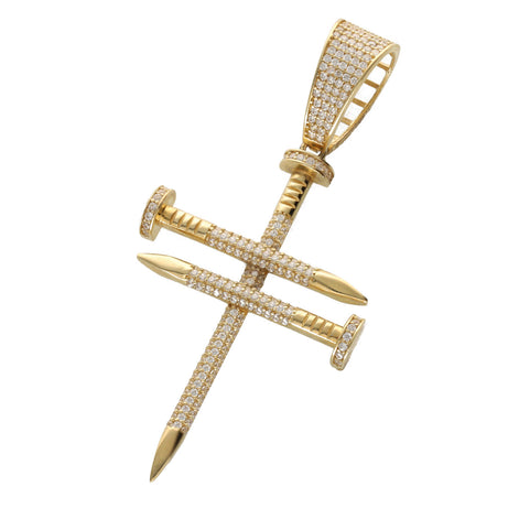14K yellow gold nail cross charm with cubic zirconia stones on white background.
