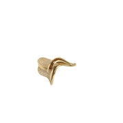 Close-up detail of 14K gold sculptural wave ring showing sparkling cubic zirconia stones and flowing design