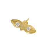 A 14 karat gold Sta Lucia eyes azabache charm with zirconia stones.
