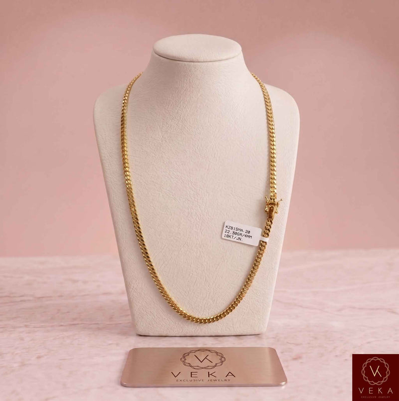 14K solid yellow gold 4mm Miami Cuban link chain presented on a luxury neck mannequin display with Veka Jewelry brand card.