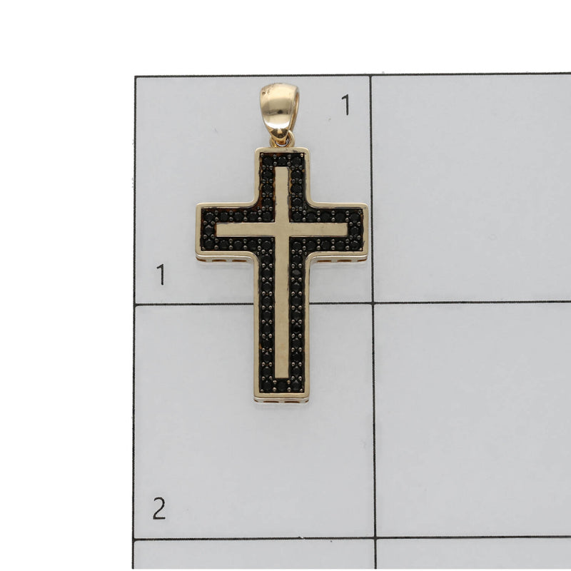 Size and scale measurement of 14K yellow gold black CZ cross pendant on grid ruler - Veka Jewelry