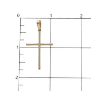 Measurement ruler showing 43mm height and 23mm width of 14K solid yellow gold slim cross pendant