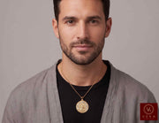 Men's 14K gold Santa Barbara pendant medal shown on neck chain for realistic fit and scale reference by Veka Jewelry