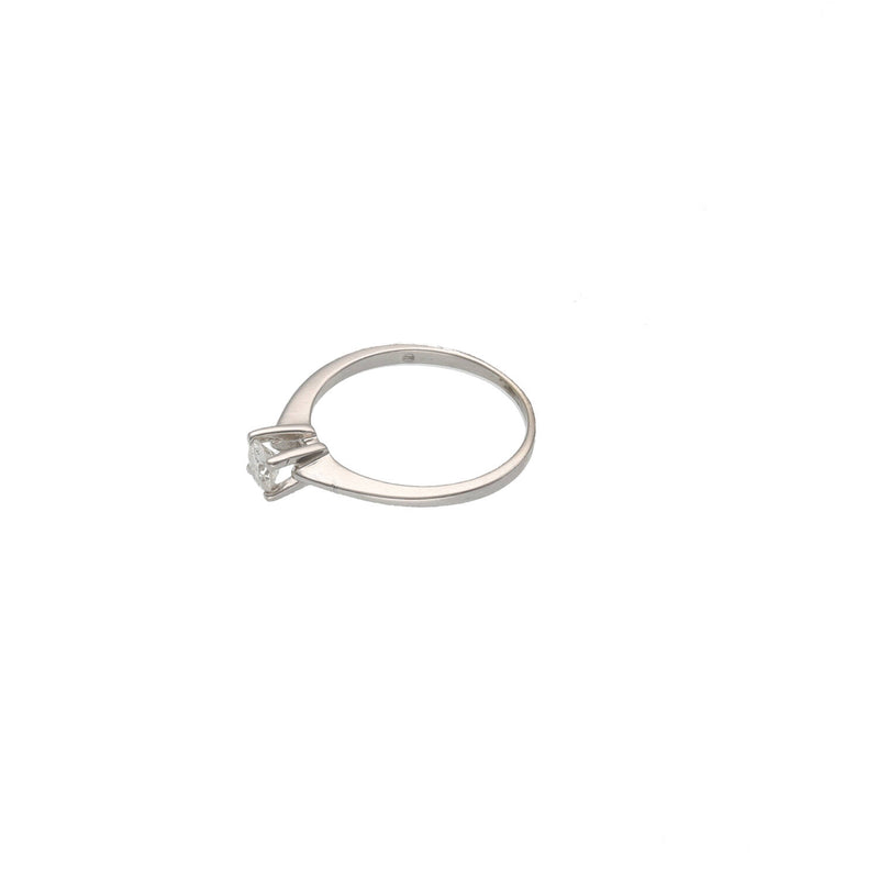 Side profile of a classic 14K gold diamond engagement ring showing the height and prong detail.