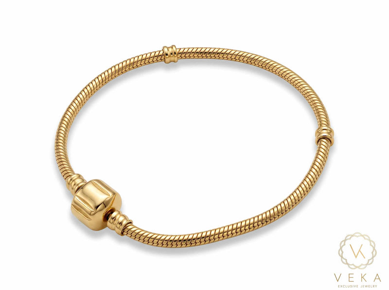 14K real yellow gold snake chain charm bracelet with barrel snap clip clasp on clean white background - Veka Jewelry.