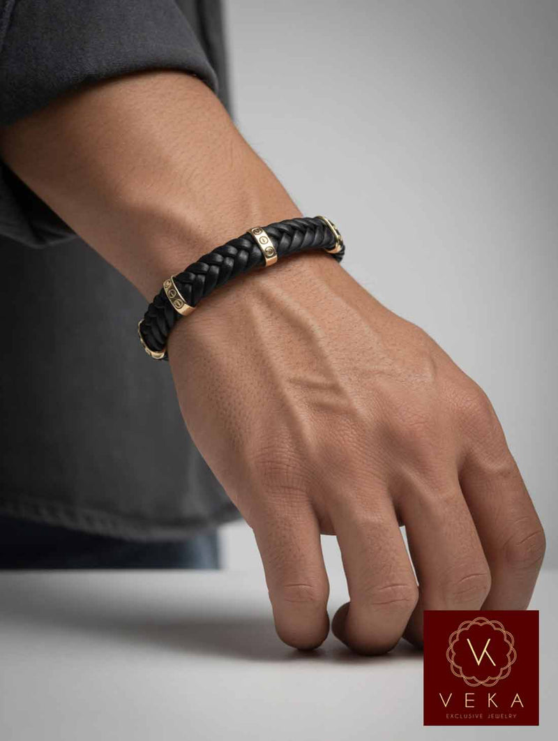 14K solid yellow gold braided black leather bracelet for men worn on wrist – luxury adjustable men's bracelet by VEKA Jewelry