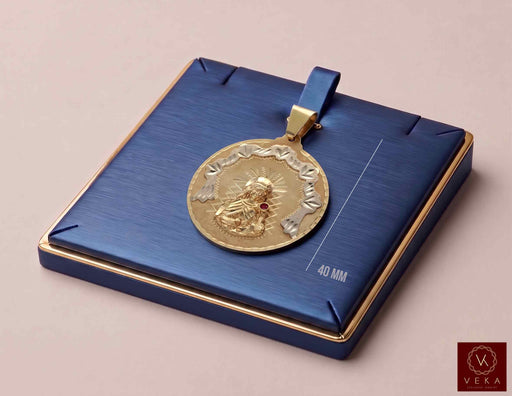 Solid 14K two-tone yellow and white gold Santa Barbara medal pendant displayed on luxury navy jewelry tray by Veka Jewelry