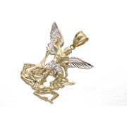 Front view of the handcrafted 14K two-tone yellow and white gold Saint Michael defeating the dragon pendant.
