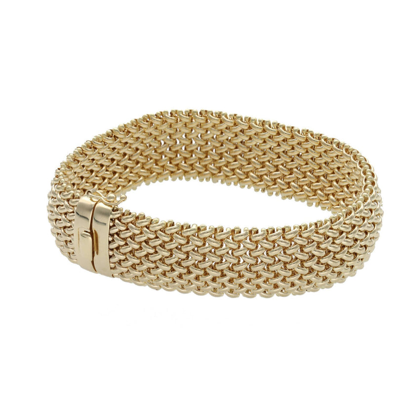 A masterpiece of texture and light. This 18mm popcorn-style bracelet is crafted in genuine 14k yellow gold, weighing a substantial 22.3 grams. Finished with a high-security fancy box lock, it offers a bold look for the modern woman who values classic craftsmanship.