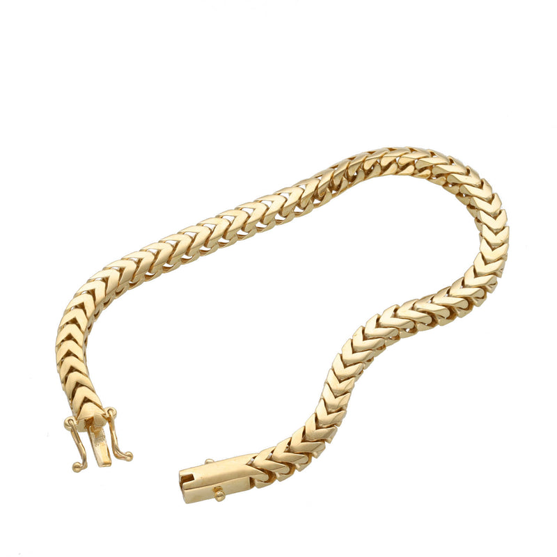 Unclasped 14K yellow gold 5mm Franco chain bracelet demonstrating flexibility and box lock ends.