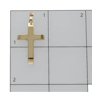 14K yellow gold cross pendant on a scale measurement grid showing exact dimensions of 35.5mm by 18.2mm by Veka Jewelry.