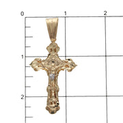 Size measurement comparison showing 60mm length of 14k gold nugget crucifix cross pendant next to ruler scale