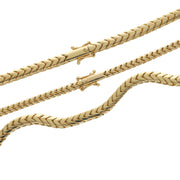 A macro close-up photograph highlighting the specific woven pattern and individual link structure of the 3mm and 4mm 14K yellow gold hollow Franco chain, showing how they connect.