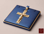 14K solid yellow gold nugget Jesus Christ crucifix pendant presented on a luxury blue display tray by Veka Jewelry.