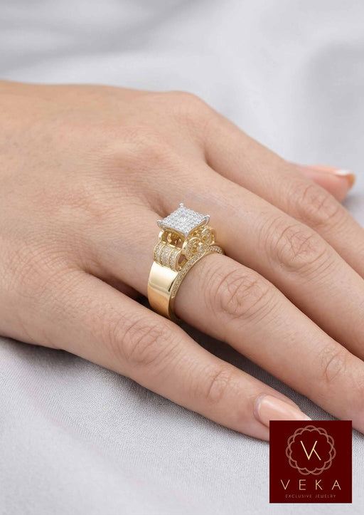 Stunning 14K yellow gold engagement ring with a princess-cut CZ center stone shown on a model's hand