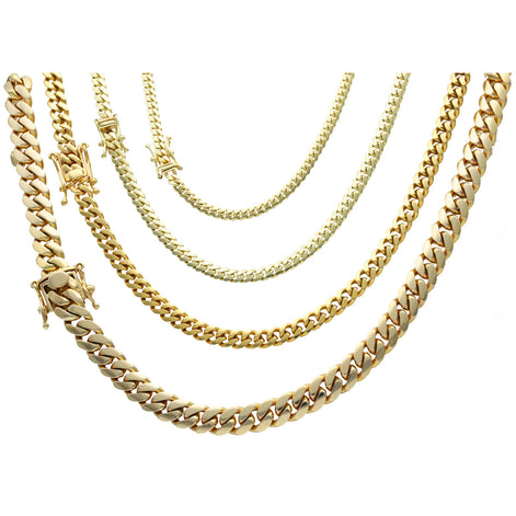 Gold chain necklaces of different styles on a white background