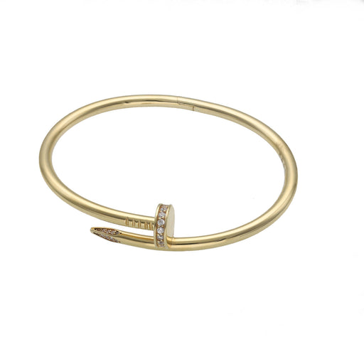 14k Gold Nail bracelet with clear zirconium stones accents on a white background