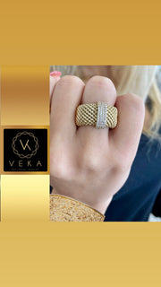 a Woman wearing a super Elegant 14k Band in popcorn style.